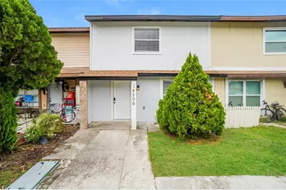 14206 Village Terrace Drive, Tampa, FL 33624 - Photo 1