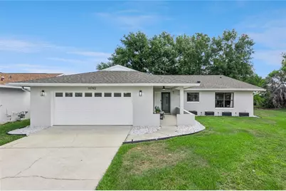 10792 Lazy Lake Drive, Orlando, FL 32821 - Photo 1