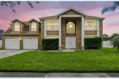 7925 Tumblestone Drive, Orlando, FL 32819 - Photo 1