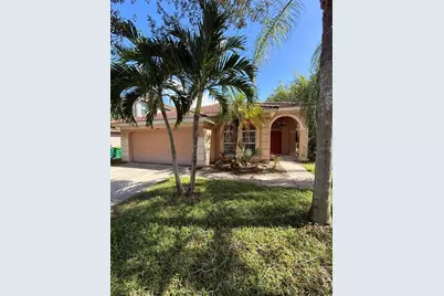 8376 Laurel Lakes Boulevard, Naples, FL 34119 - Photo 1
