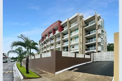 49 Benjamin Gomez St, Ensenada Ward, Solymar Condo #304, Rincon, PR 00677 - Photo 1