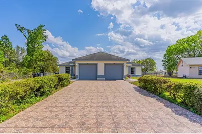 748 Mink Court, Poinciana, FL 34759 - Photo 1
