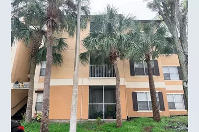 7606 Pissarro Drive #105, Orlando, FL 32819 - Photo 1