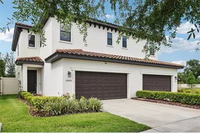13049 Sanctuary Village Lane, Tampa, FL 33624 - Photo 1