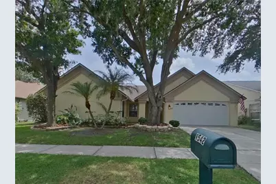 9542 Pebble Glen Avenue, Tampa, FL 33647 - Photo 1