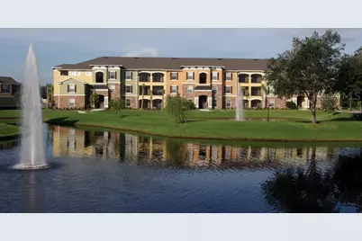 10125 Courtney Palms Boulevard #303, Tampa, FL 33619 - Photo 1