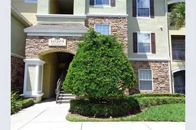 10205 Courtney Palms Boulevard #204, Tampa, FL 33619 - Photo 1