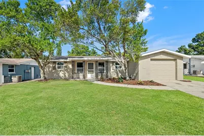7705 Birchwood Drive, Port Richey, FL 34668 - Photo 1