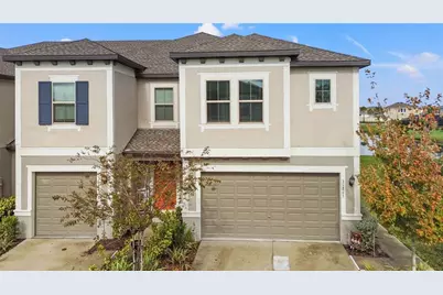 31865 Blue Passing Loop, Wesley Chapel, FL 33545 - Photo 1