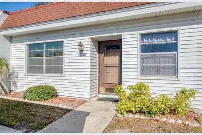 13811 Mission Oaks Boulevard #E, Seminole, FL 33776 - Photo 1