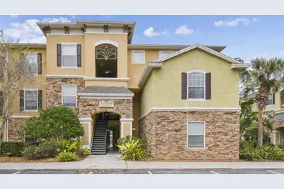 10209 Courtney Palms Boulevard #101, Tampa, FL 33619 - Photo 1