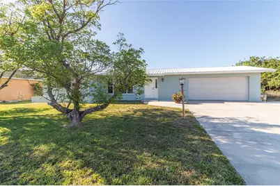 22465 Lewiston  Avenue, Port Charlotte, FL 33952 - Photo 1