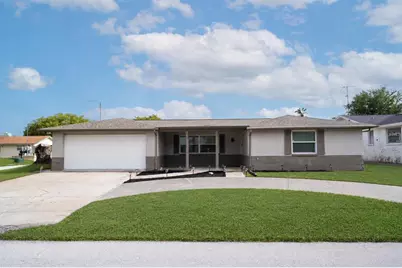 7715 Foxbloom Drive, Port Richey, FL 34668 - Photo 1