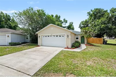 11917 Mango Groves Boulevard, Seffner, FL 33584 - Photo 1