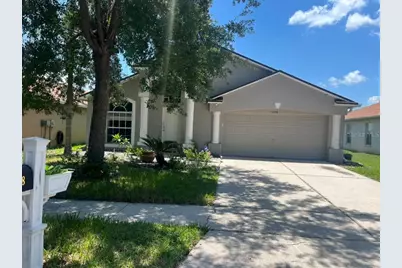 30918 Stone Arch Avenue, Wesley Chapel, FL 33545 - Photo 1
