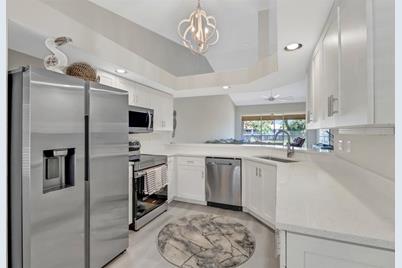 1080 Manor Lake Drive #A205, Naples, FL 34110 - Photo 1