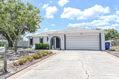 9942 Woodridge Court, Port Richey, FL 34668 - Photo 1