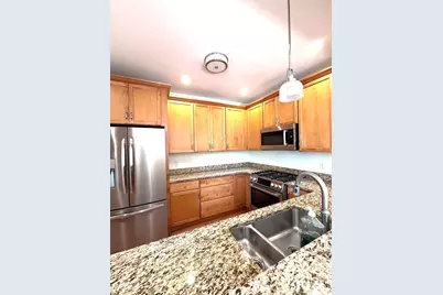 92 Johnson Woods Dr #92, Reading, MA 01867 - Photo 1