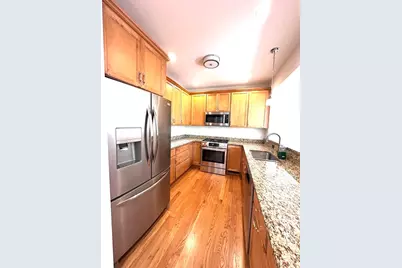 92 Johnson Woods Dr #92, Reading, MA 01867 - Photo 2