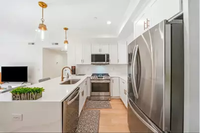 69 Cummins Hwy #102, Boston, MA 02131 - Photo 12