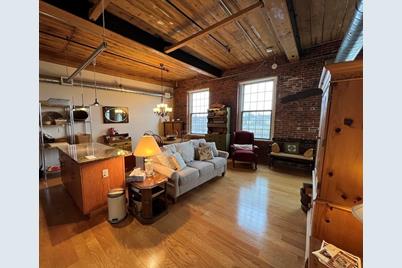 130 John St #216, Lowell, MA 01852 - Photo 1