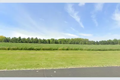 N909  Winds Way, Ashippun, WI 53066 - Photo 1