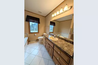 1001  Spring Waters Dr, Oconomowoc, WI 53066 - Photo 12