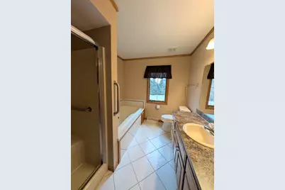 1001  Spring Waters Dr, Oconomowoc, WI 53066 - Photo 14