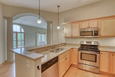 N51W34861  Wisconsin Ave #2110, Oconomowoc, WI 53069 - Photo 1