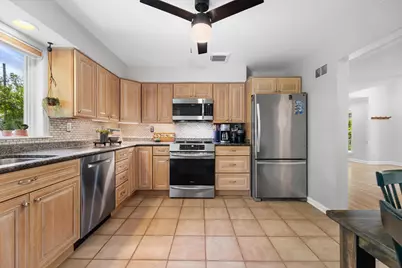 9060 N Meadowlark Ln, Bayside, WI 53217 - Photo 16