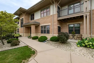 W129N6811  Northfield Dr #107, Menomonee Falls, WI 53051 - Photo 1