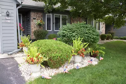 W180N9872  Riversbend Cir, Germantown, WI 53022 - Photo 1