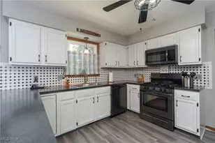 2709 Country Squire St NW, Uniontown, OH 44685 - Photo 6