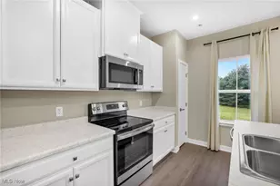 316 E Reno Dr, Louisville, OH 44641 - Photo 6