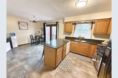 7031 Woodthrush Drive, Painesville Twp, OH 44077 - Photo 6