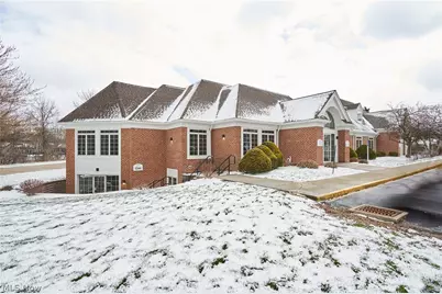 799 White Pond Drive #E, Akron, OH 44320 - Photo 1