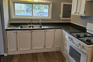 1424 4th St, Lakemore, OH 44250 - Photo 16