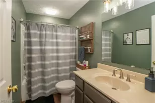304 Rodeo Cir, Louisville, OH 44641 - Photo 32