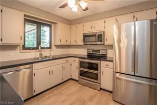 5251 Tanglewood Dr NE, Louisville, OH 44641 - Photo 12