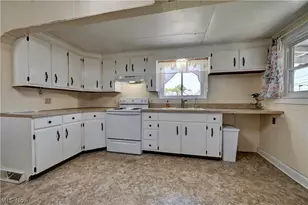 129 2nd St SW, Strasburg, OH 44680 - Photo 4