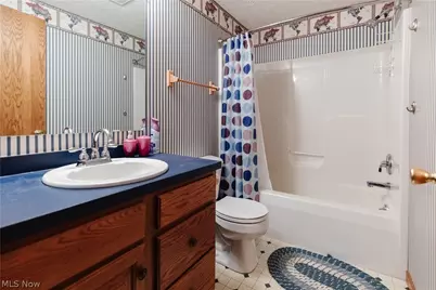 5972 Sunscape Drive NE, Louisville, OH 44641 - Photo 18