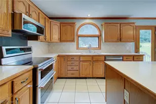 6094 Coppercove Cir NW, North Canton, OH 44720 - Photo 14