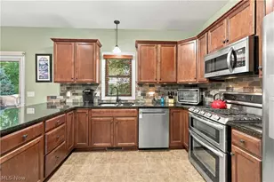 7028 Emerald Cove Ave NW, Canal Fulton, OH 44614 - Photo 10