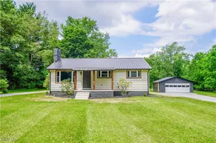 5589 Breezewood Dr NE, Canton, OH 44705 - Photo 1