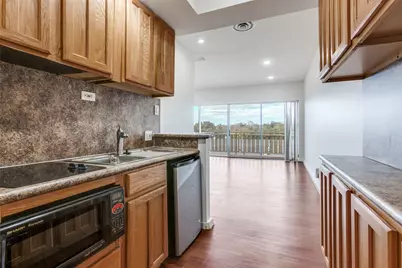 6211 W Northwest Highway #G417, Dallas, TX 75225 - Photo 8