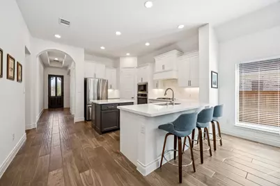 8817 Navidad Falls Drive, McKinney, TX 75071 - Photo 6