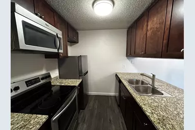 2200 E Trinity Mills Road #301, Carrollton, TX 75006 - Photo 8