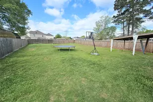 8853 E Buffalo Cir, Willis, TX 77378 - Photo 16