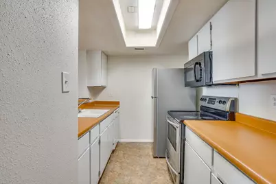 7431 Holly Hill #101, Dallas, TX 75231 - Photo 30