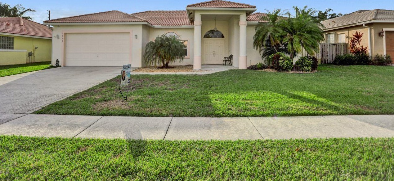 7090 Lake Island Dr, Lake Worth, FL 33467-7949